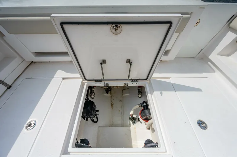  Yacht Photos Pics Open storage compartment on a 2015 Belzona 32C boat.