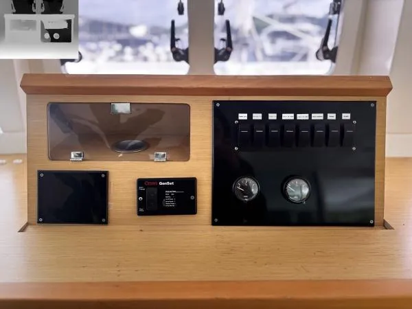 Sea Serenity Yacht Photos Pics Control panel of a 2012 Lagoon 560 yacht with switches and gauges.