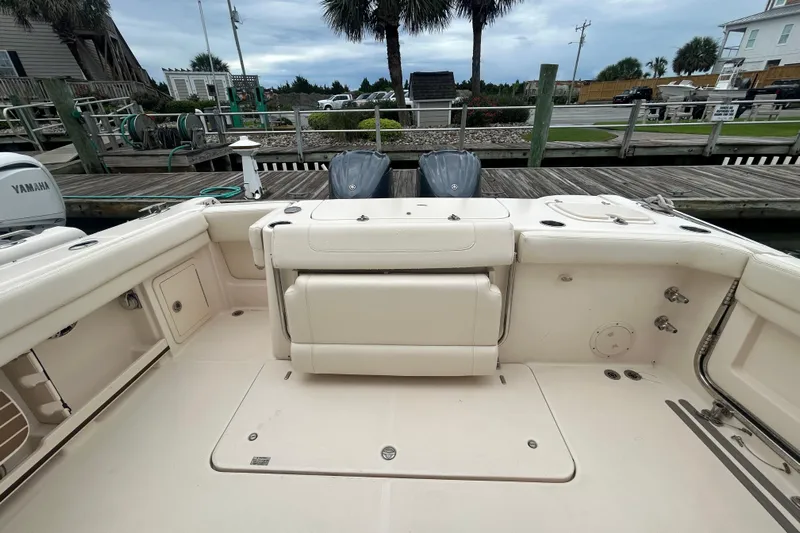  Yacht Photos Pics 2023 Grady-White Freedom 307 boat interior with Yamaha engines at dock.