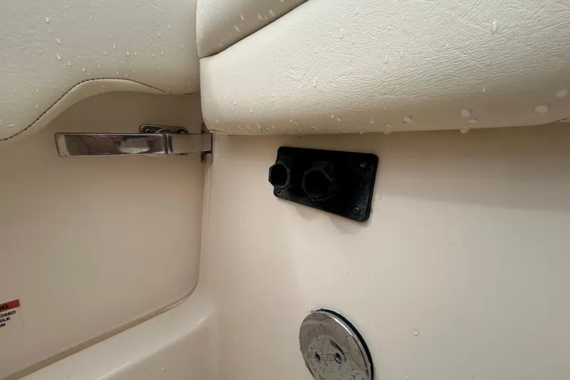  Yacht Photos Pics Interior detail of 2023 Grady-White Freedom 307 boat, featuring a sleek handle and control panel.