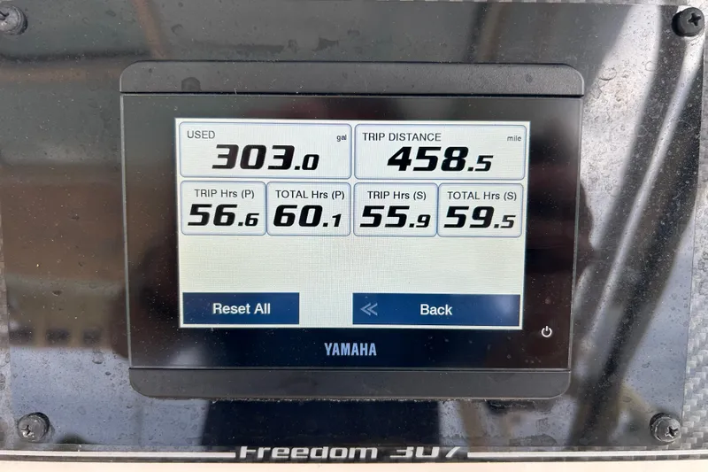  Yacht Photos Pics Display screen on 2023 Grady-White Freedom 307 showing fuel usage and trip data.