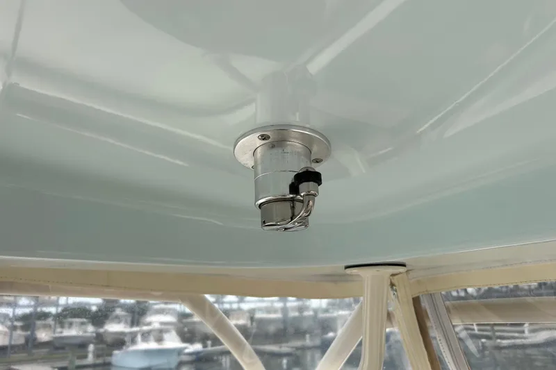  Yacht Photos Pics Ceiling-mounted fixture inside 2023 Grady-White Freedom 307 boat cabin.