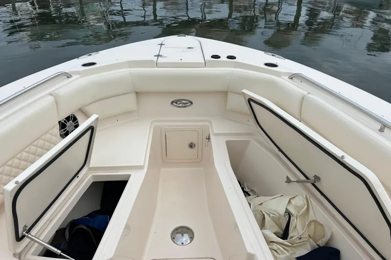 Yacht Photos Pics 2023 Grady-White Freedom 307 boat interior with open storage compartments.