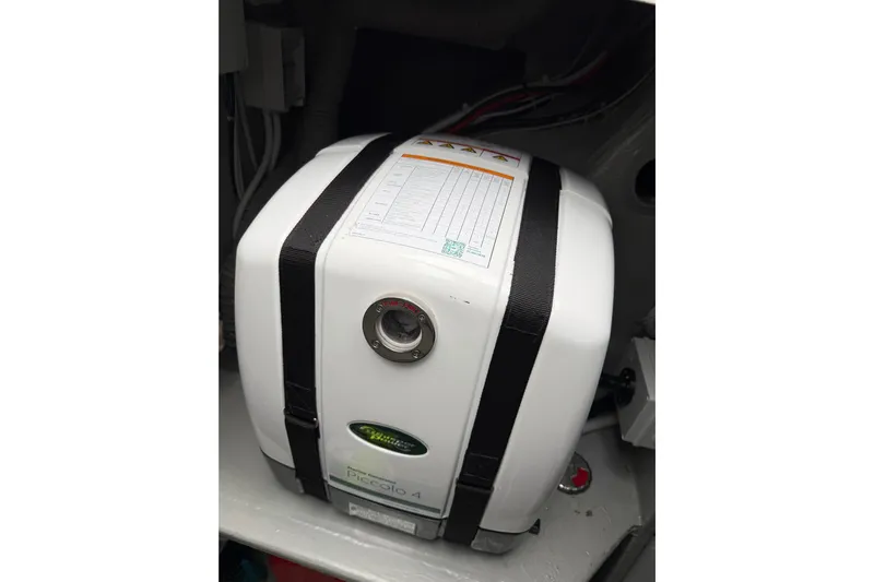 Aurora Yacht Photos Pics Water heater in 2025 C-Catamarans 48, secured with straps in engine compartment.