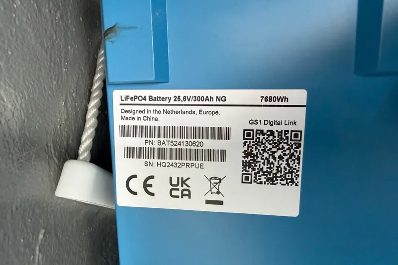 Aurora Yacht Photos Pics LiFePO4 battery label on blue surface, 7680Wh, designed in Netherlands, made in China.