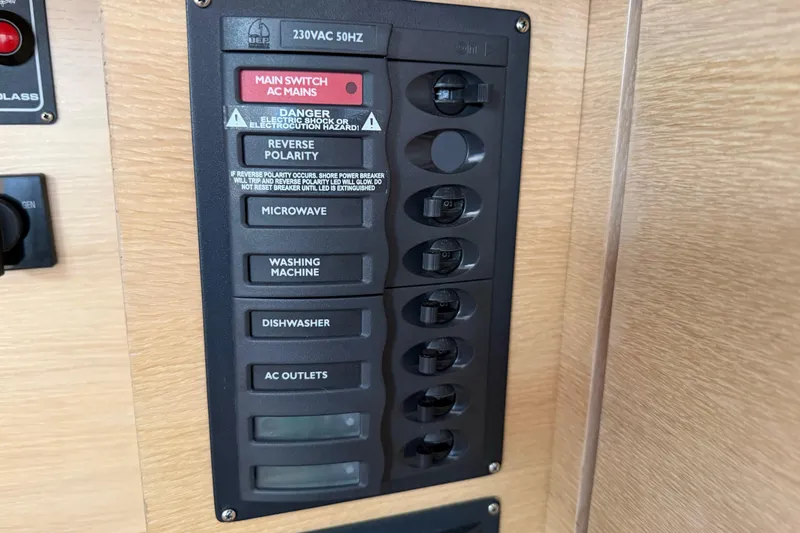 Aurora Yacht Photos Pics Electrical panel on 2025 C-Catamarans 48, featuring switches for various appliances.