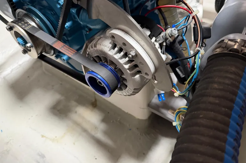 Aurora Yacht Photos Pics Engine component of 2025 C-Catamarans 48, featuring belts and wiring.