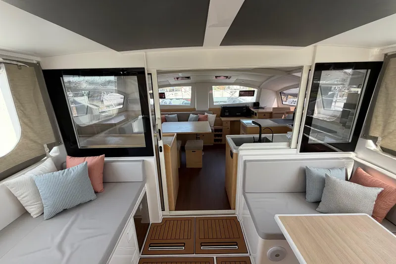 Aurora Yacht Photos Pics Luxurious interior of 2025 C-Catamarans 48, featuring modern seating and elegant design.