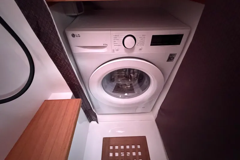 Aurora Yacht Photos Pics Washing machine in 2025 C-Catamarans 48 interior, compact and efficient design.