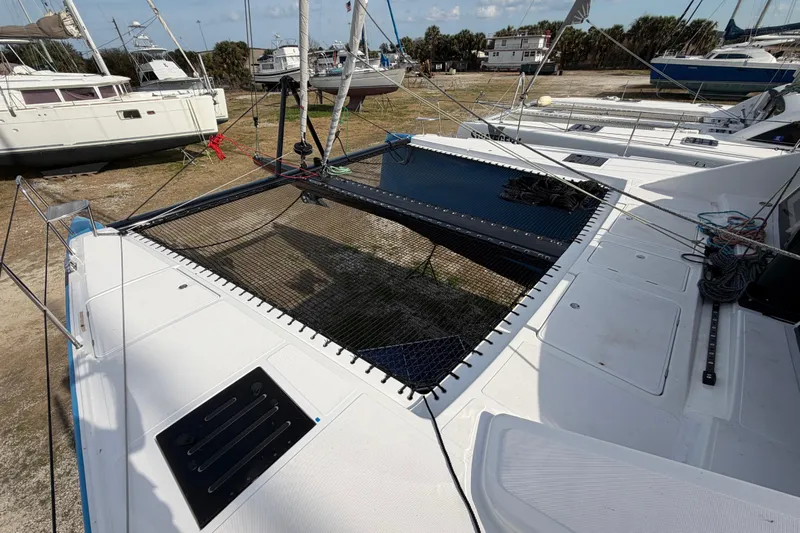 Aurora Yacht Photos Pics 2025 C-Catamarans 48 on land, showcasing deck and netting features.