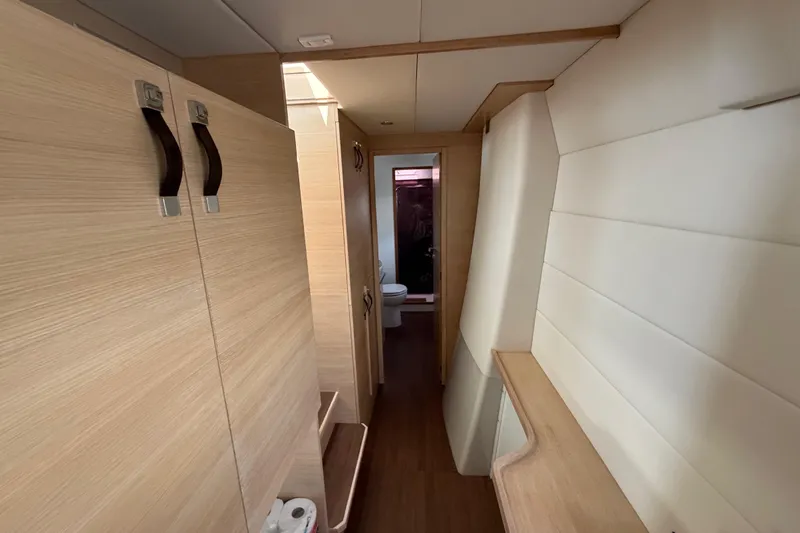 Aurora Yacht Photos Pics Interior hallway of 2025 C-Catamarans 48, featuring modern wood finishes and compact design.