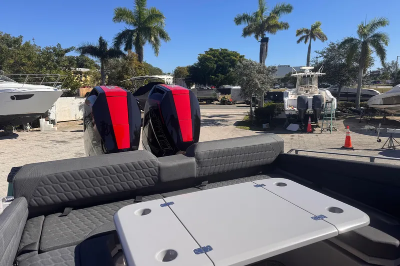  Yacht Photos Pics 2025 Skipper-BSK 38NC boat with dual engines, docked under palm trees.