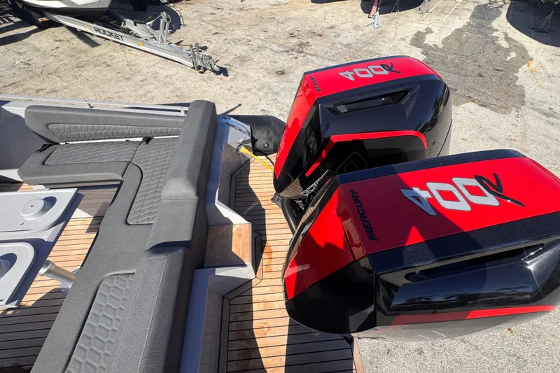  Yacht Photos Pics 2025 Skipper-BSK 38NC boat with dual Mercury 400R engines and sleek seating.