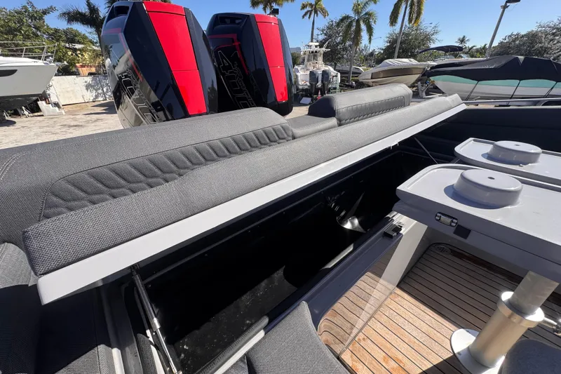  Yacht Photos Pics 2025 Skipper-BSK 38NC boat with open storage, dual engines, and sleek deck design.