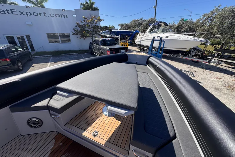  Yacht Photos Pics 2025 Skipper-BSK 38NC boat with sleek deck design in a marina setting.