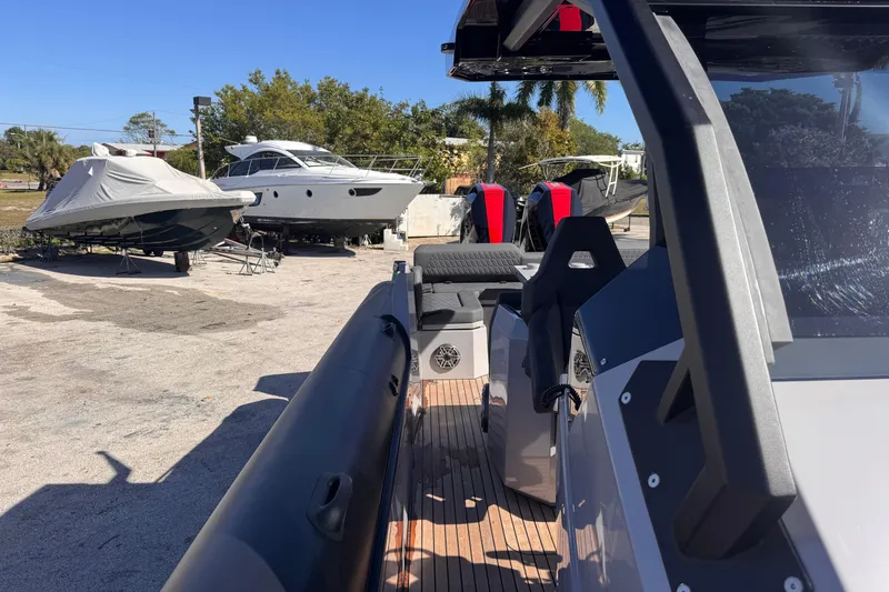  Yacht Photos Pics 2025 Skipper-BSK 38NC boat in a marina with other vessels.