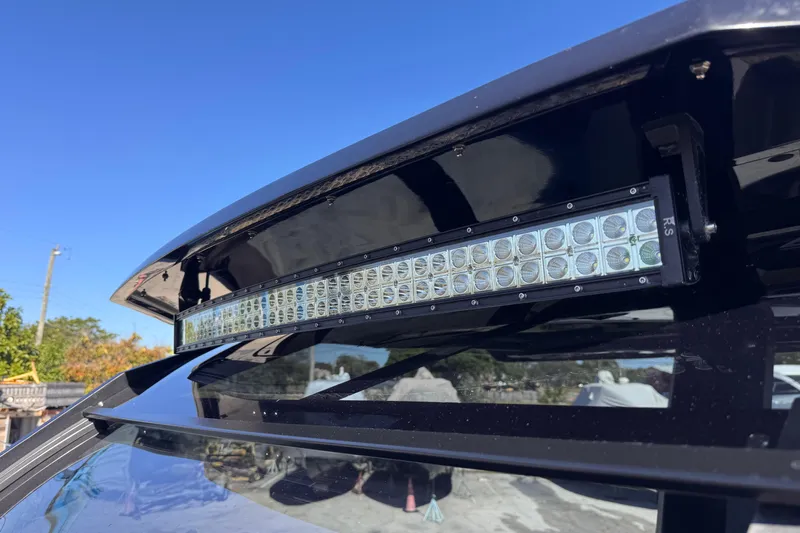  Yacht Photos Pics 2025 Skipper-BSK 38NC with LED light bar under blue sky.