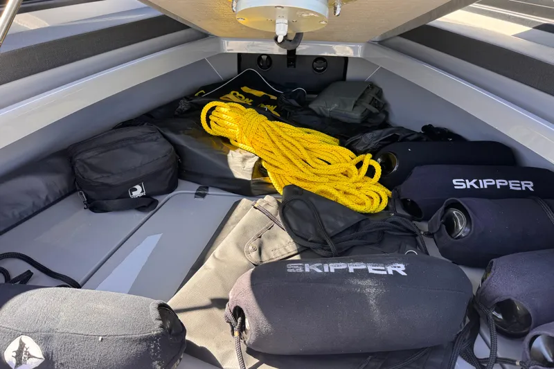  Yacht Photos Pics Interior of 2025 Skipper-BSK 38NC boat with equipment and yellow rope.