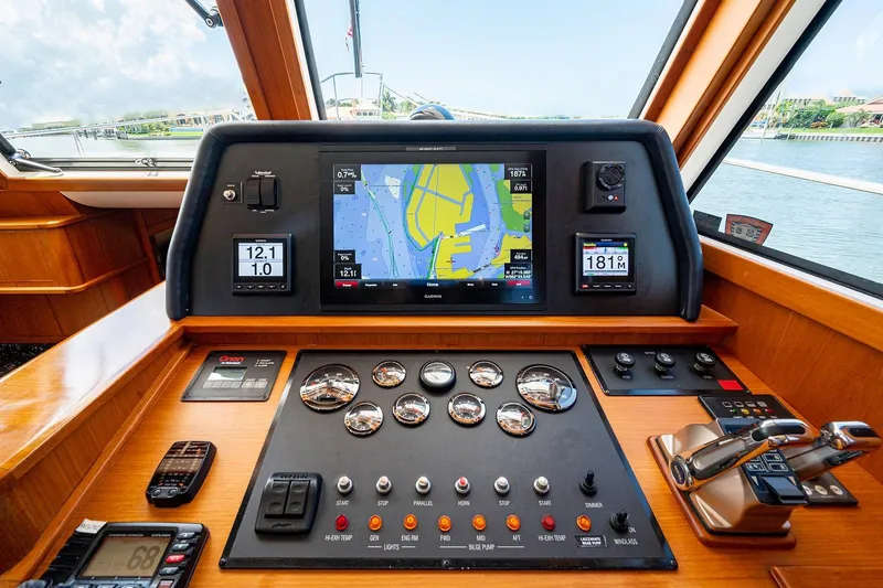 First Light Yacht Photos Pics Helm of 2007 Grand Banks 47 Classic yacht with navigation display and controls.