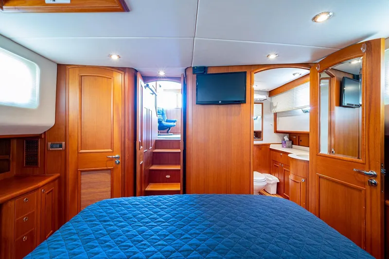 First Light Yacht Photos Pics Luxurious interior of 2007 Grand Banks 47 Classic yacht with wood finish and modern amenities.