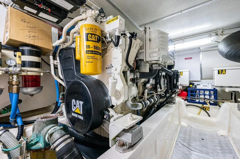 First Light Yacht Photos Pics Engine room of 2007 Grand Banks 47 Classic with CAT Marine Power engine.