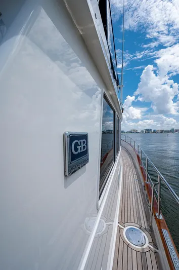 First Light Yacht Photos Pics 2007 Grand Banks 47 Classic yacht, side view with ocean and sky backdrop.