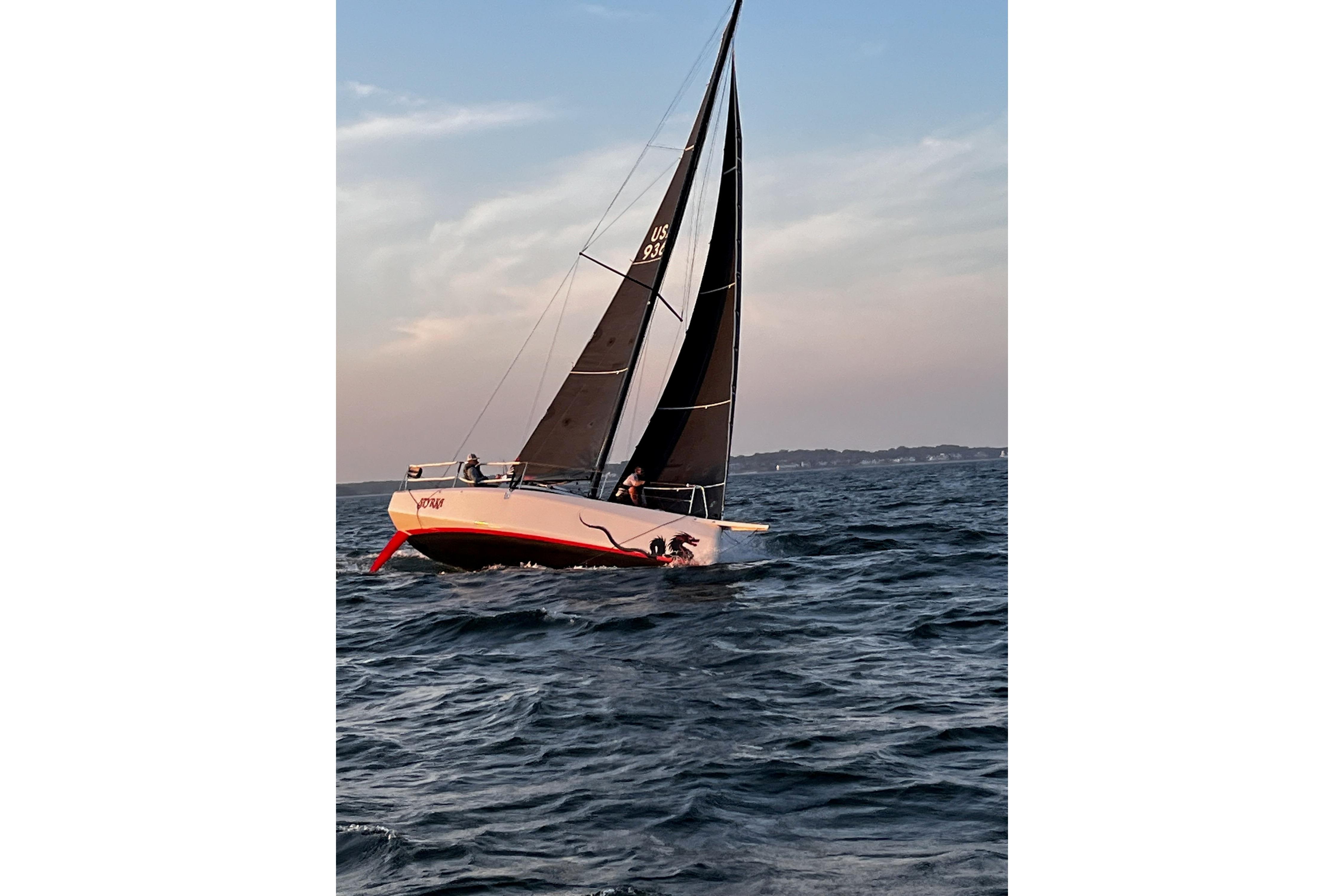 Sailing Dehler 30 OD yacht on open water at sunset, 2020 model.