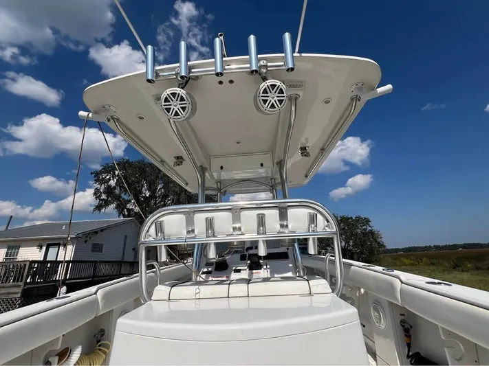  Yacht Photos Pics 2013 Jupiter 30 FS boat with T-top and rod holders under a clear blue sky.