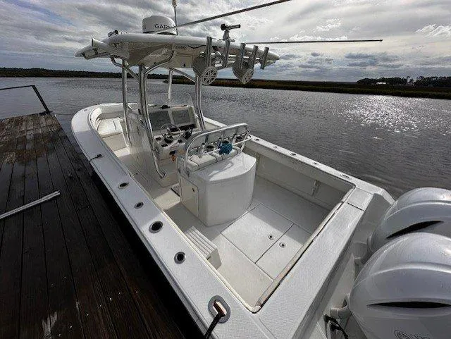  Yacht Photos Pics 2013 Jupiter 30 FS boat docked by a serene waterfront.