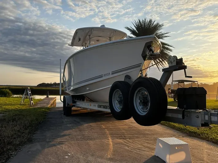 Yacht Photos Pics 2013 Jupiter 30 FS boat on trailer at sunset, ready for launch.