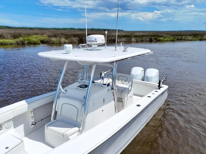  Yacht Photos Pics 2013 Jupiter 30 FS boat on calm water with clear sky background.