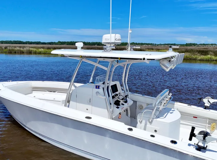  Yacht Photos Pics 2013 Jupiter 30 FS boat on calm water with clear blue sky.