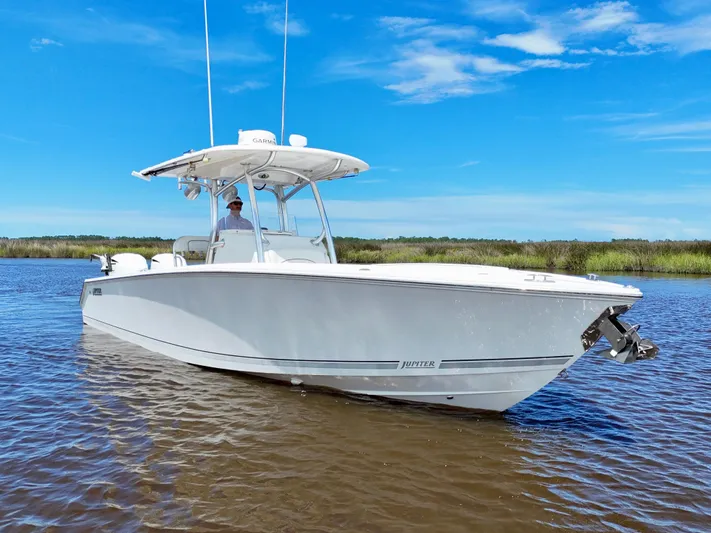  Yacht Photos Pics 2013 Jupiter 30 FS boat on calm water under clear blue sky.