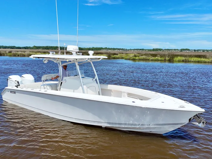 Yacht Photos Pics 2013 Jupiter 30 FS boat on calm water under clear blue sky.