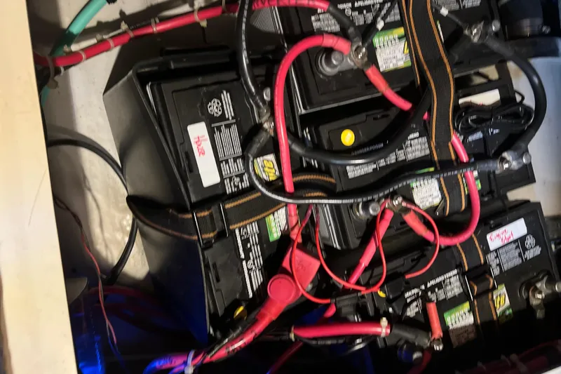 Thumper Yacht Photos Pics Battery compartment of a 2001 Tartan 3700 Sloop with connected cables.