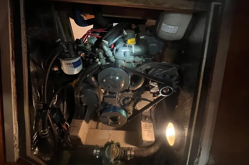 Thumper Yacht Photos Pics Engine compartment of a 2001 Tartan 3700 Sloop, featuring a Yanmar engine.