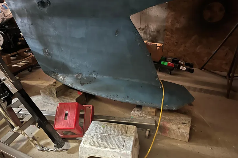 Thumper Yacht Photos Pics Tartan 3700 Sloop 2001 keel in workshop, supported by blocks and stools.