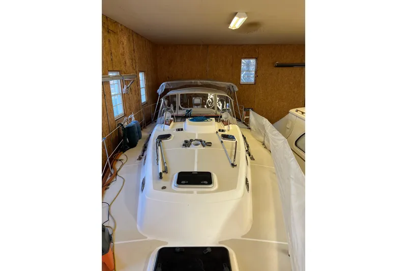 Thumper Yacht Photos Pics Tartan 3700 Sloop 2001 in storage, showcasing deck and cabin details.