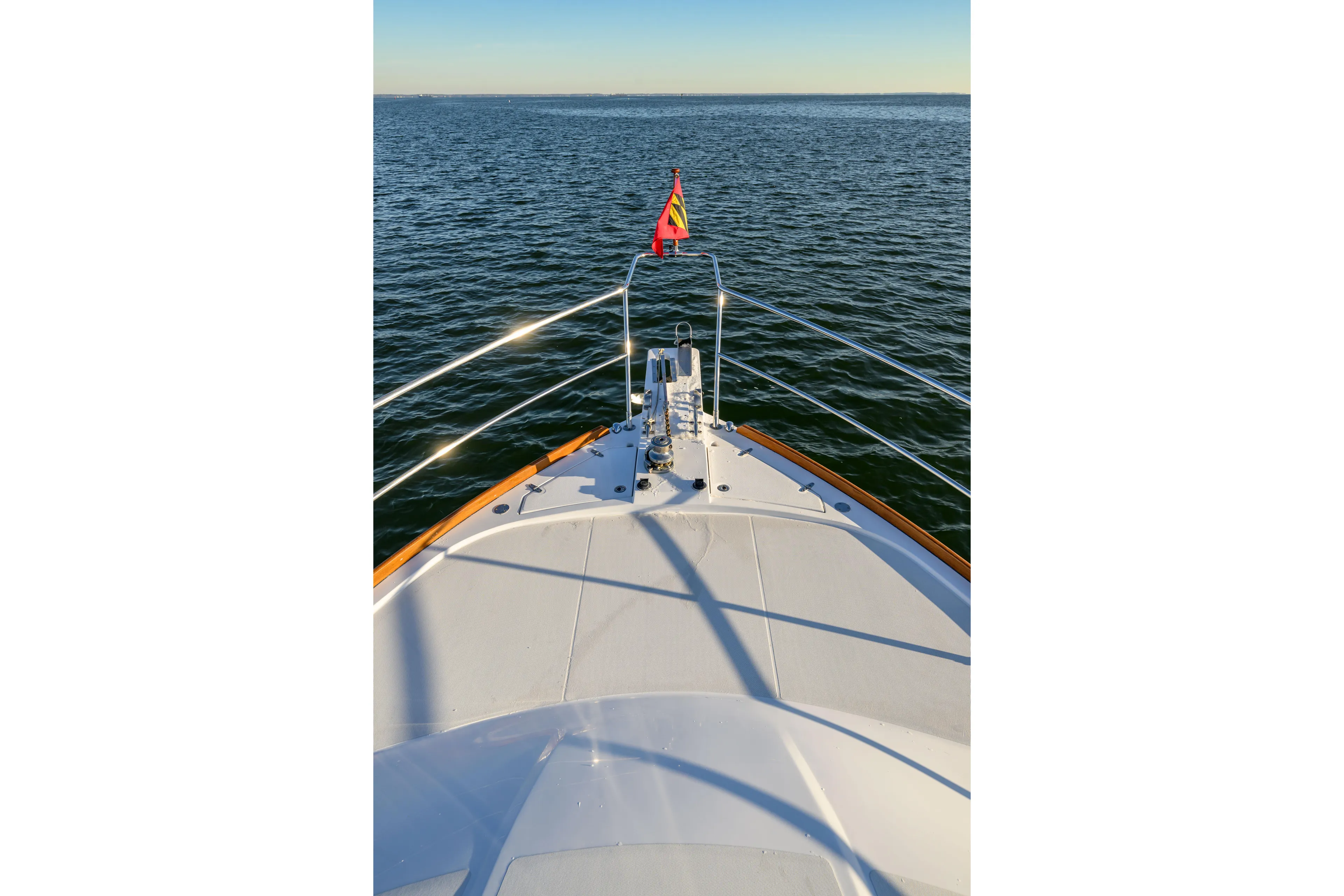 More Mojo Yacht Photos Pics Bow view of 2009 Sabre 42 Hard Top Express on open water.