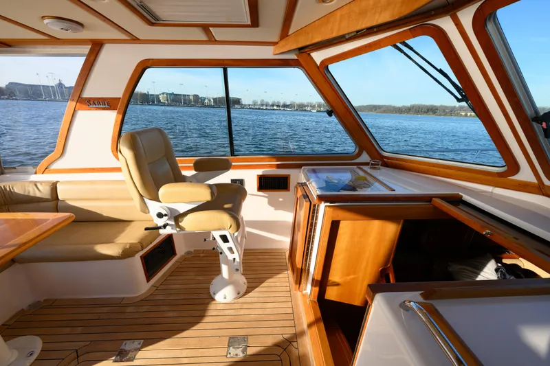 More Mojo Yacht Photos Pics 2009 Sabre 42 Hard Top Express interior with leather seating and scenic water view.