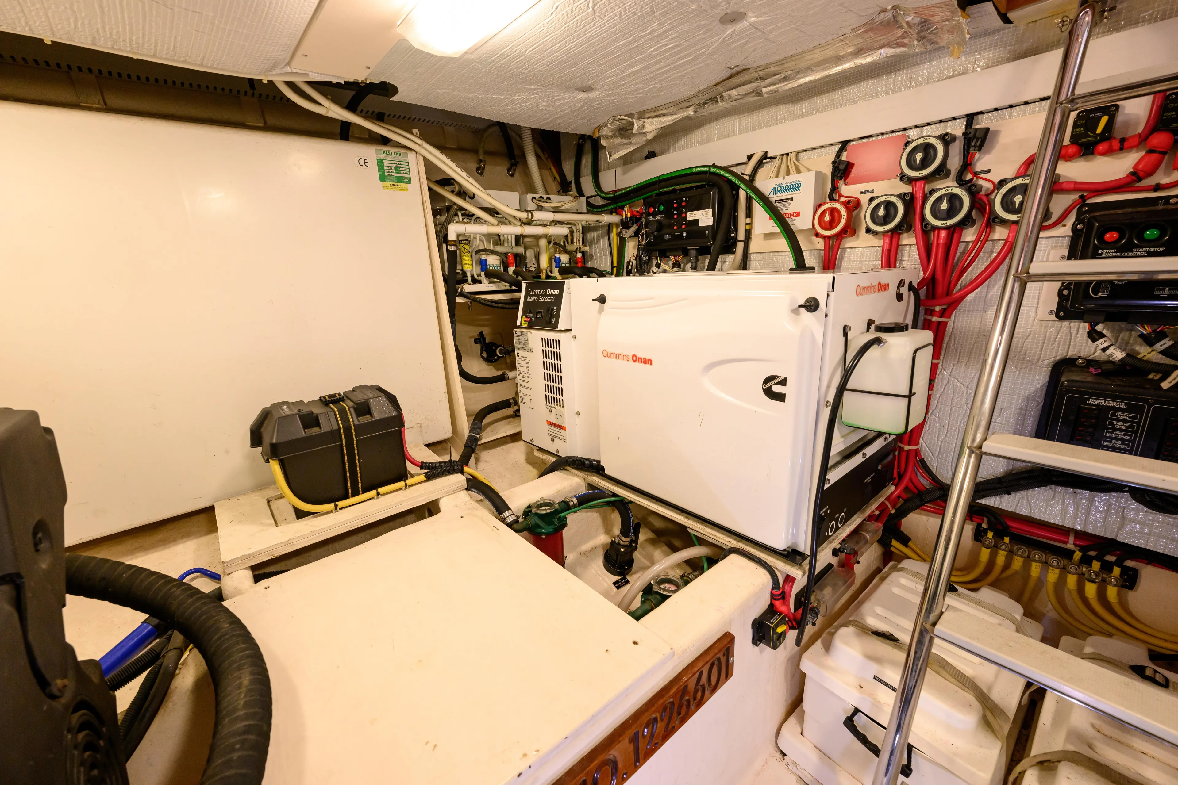 More Mojo Yacht Photos Pics Engine room of 2009 Sabre 42 Hard Top Express with Cummins Onan generator.