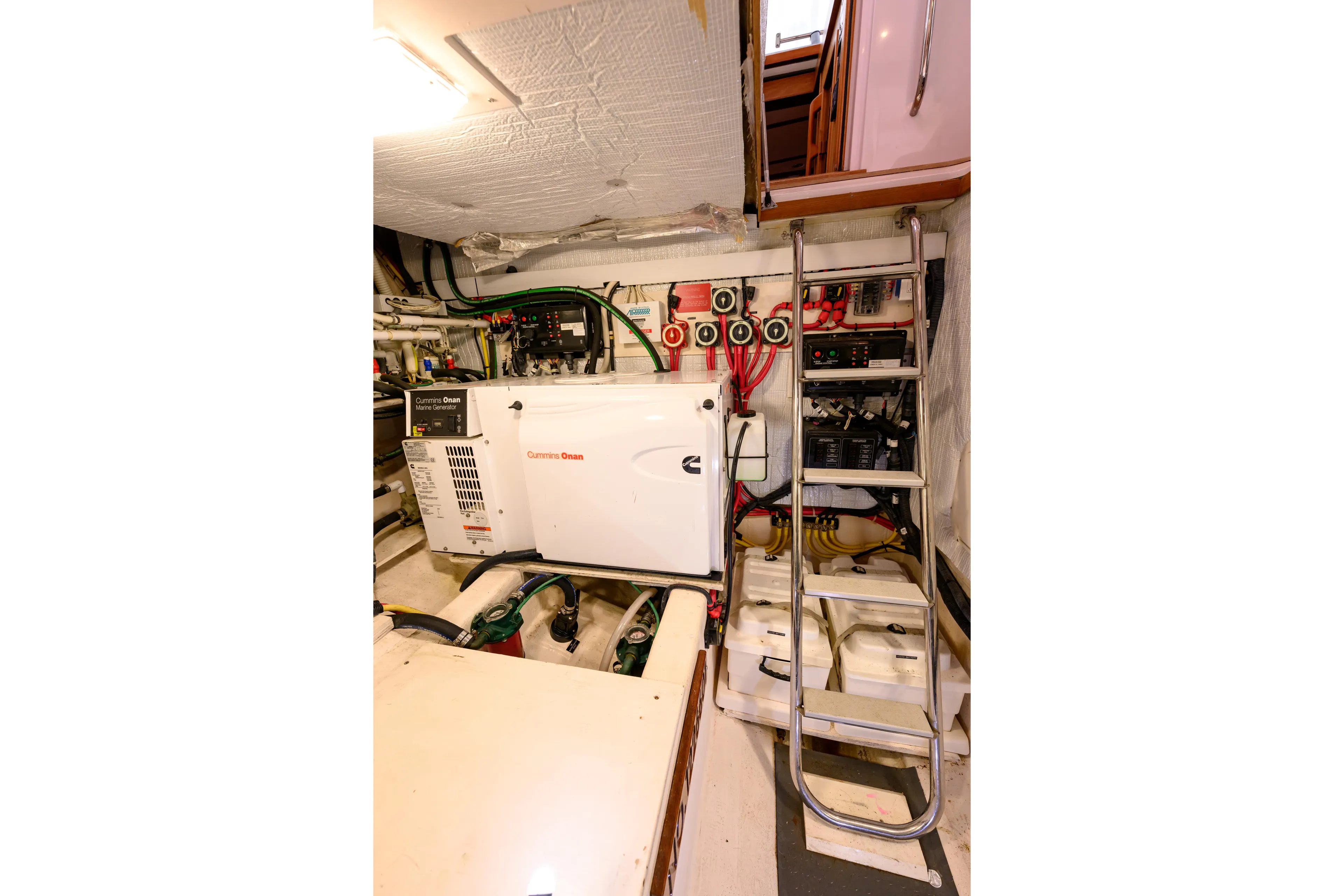 More Mojo Yacht Photos Pics Engine room of 2009 Sabre 42 Hard Top Express with Cummins Onan generator.