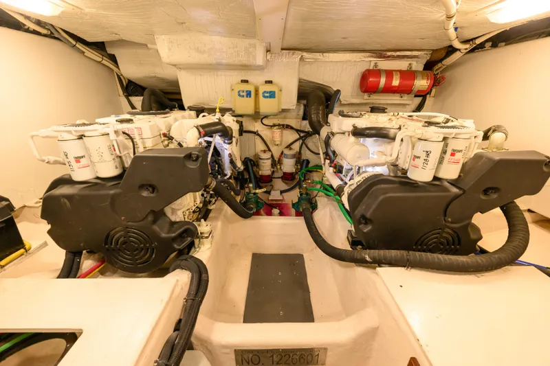 More Mojo Yacht Photos Pics Engine room of 2009 Sabre 42 Hard Top Express with dual engines and fire extinguisher.
