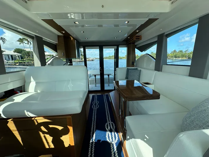 Aeronautical Yacht Photos Pics Interior of 2022 Tiara Yachts C39 Coupe with elegant seating and scenic water views.