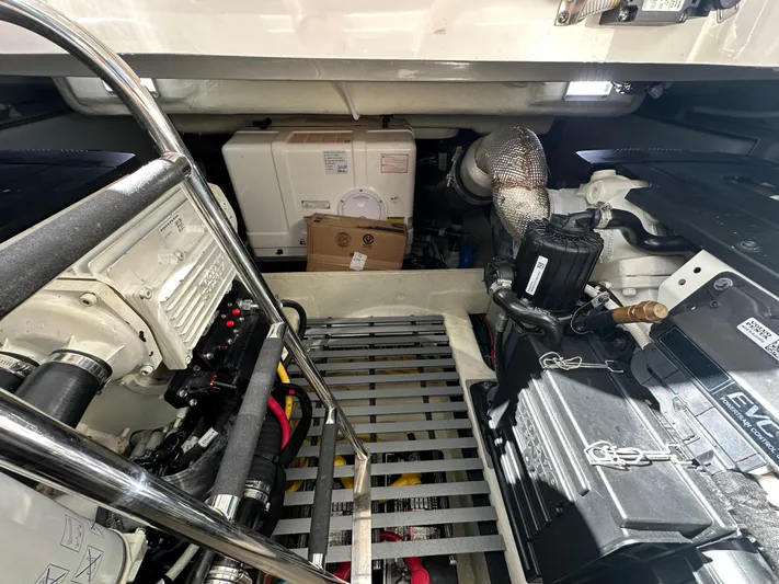 Aeronautical Yacht Photos Pics Engine room of 2022 Tiara Yachts C39 Coupe, showcasing mechanical components and equipment.