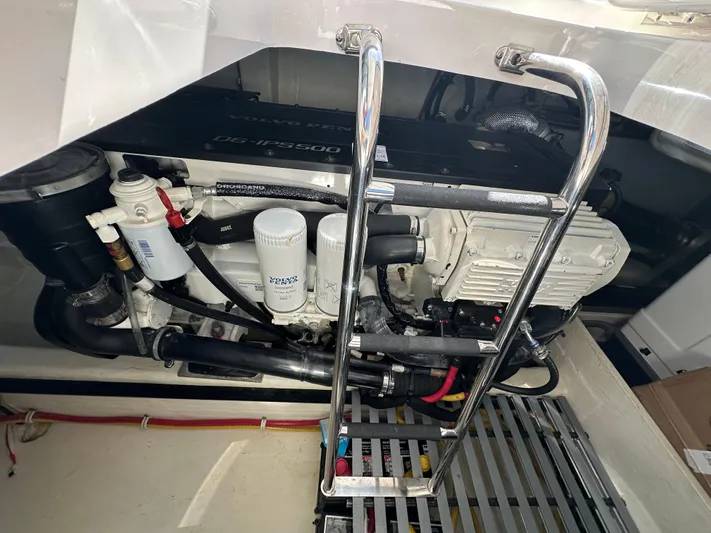 Aeronautical Yacht Photos Pics Engine compartment of 2022 Tiara Yachts C39 Coupe with visible components and ladder.