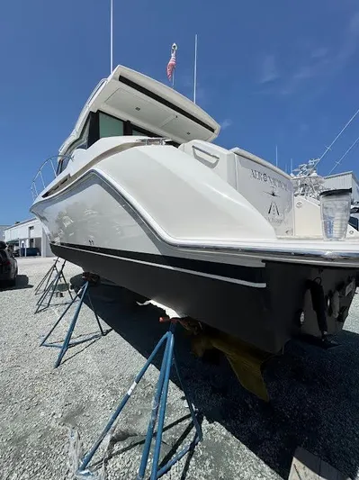 Aeronautical Yacht Photos Pics 2022 Tiara Yachts C39 Coupe on stands, viewed from the rear under a clear blue sky.