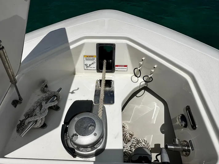  Yacht Photos Pics 2020 Boston Whaler 380 Outrage anchor compartment with ropes and winch.