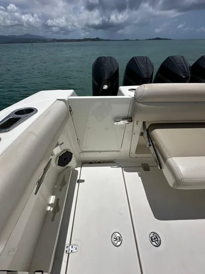  Yacht Photos Pics 2020 Boston Whaler 380 Outrage boat interior with ocean view and multiple engines.