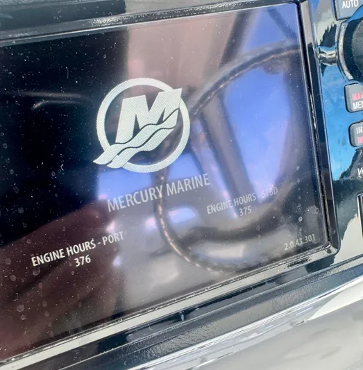  Yacht Photos Pics Mercury Marine display on 2015 Boston Whaler 315 Conquest showing engine hours.